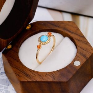 Turquoise-and-sunstone-ring-in-wooden-jewelry-box.jpg